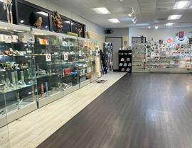 High Cash Flow Business with Drive-Thru Property on .81 AC