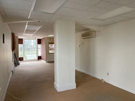 For Sale: Mixed-Use Retail/Office + 4 Apartments