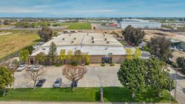 Freestanding Heavy Industrial Building w/ Office/Showroom on ±5 AC