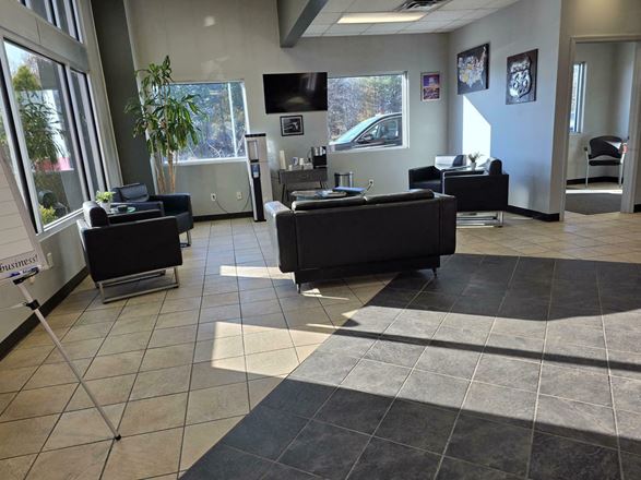 5967 Robinson Rd. - 80-vehicle paved & lighted parking lot with 1,000+/- SF of office/showroom space