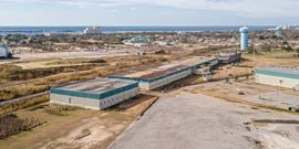 PRICED BELOW DIRT VALUE! 22 WF Acres 173K SF Bldg 20+ MW of Power Avail.
