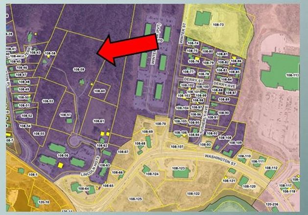 land for 52 units overlooks downtown