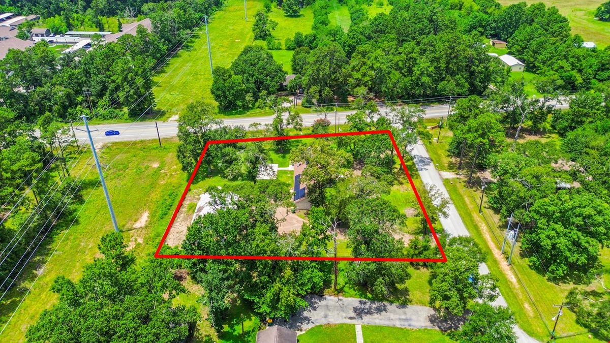 Unrestricted Versatile 1-Acre Commercial Property in Conroe –  Industrial Storage Shed & Carport & home
