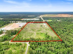 Expansive 23-Acre Tract on High-Traffic Hwy 105 – Prime Development Opportunity with Seller Financing Available