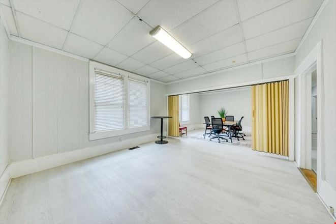 SALE OR LEASE:  Incredible commercial office or residential building with additional development potential, a brief walk from all downtown Thomasville