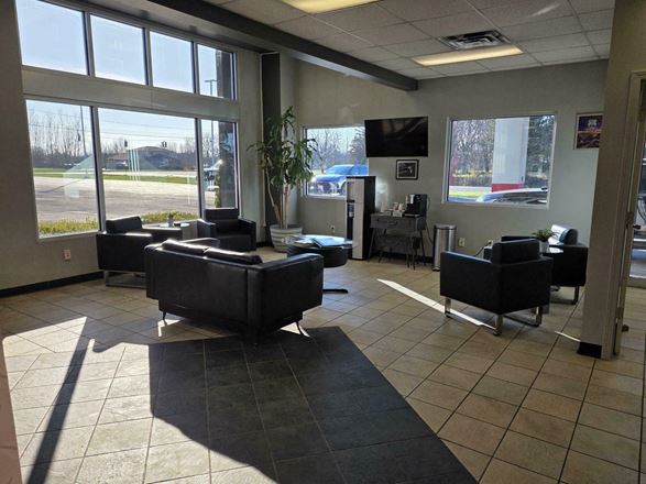 5967 Robinson Rd. - 80-vehicle paved & lighted parking lot with 1,000+/- SF of office/showroom space