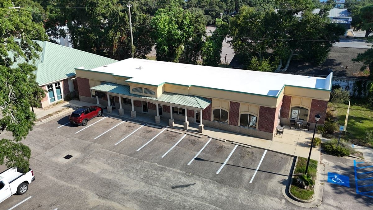 Income Producing Commercial Development w/Upside