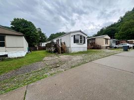 71 Saratoga St. & 11 Ticonderoga Dr.