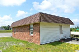 300 Ft of M-72 Frontage with 2 Acres of Flexible Office, Warehouse, and Fleet Space