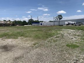 6 MINUTES FROM AIRPORT LIGHT INDUSTRIAL LAND WITH WAREHOUSE. SALE OR LEASE