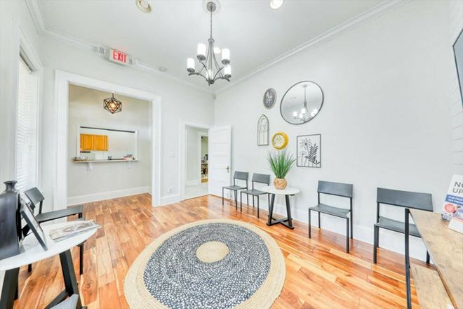 SALE OR LEASE:  Incredible commercial office or residential building with additional development potential, a brief walk from all downtown Thomasville