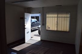 2,000 SF office warehouse unit with drive through 10'x10' doors