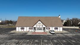 Free-Standing Commercial Building on 1.35 Acres with Abundant Parking