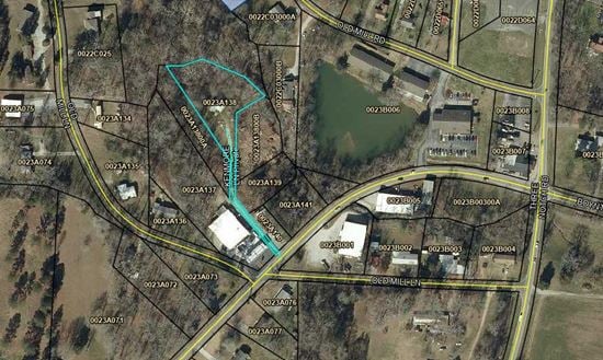 1.06 acres land and 1,101 SF house on 65 Kenmore Lane