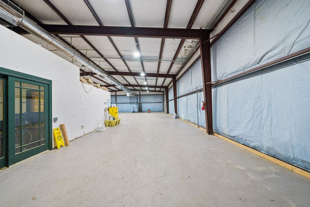 5,040 +/- SF Warehouse w/ Dock High & Grade Level Loading Areas