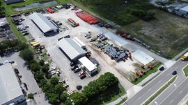 4.62 AC of Fully Fenced Industrial Land with Covered Storage