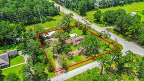 Unrestricted Versatile 1-Acre Commercial Property in Conroe –  Industrial Storage Shed & Carport & home