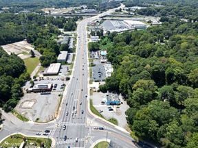 Income Producing Laundry Facility | ±4,408 SF | ±0.85 AC | Signalized Corner Development Site