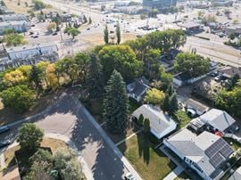 5207, 5209, 5211 - 101A Ave