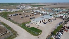 ±14,000 SF Industrial Shop | ±6.63 Fenced Yard | Williston ND