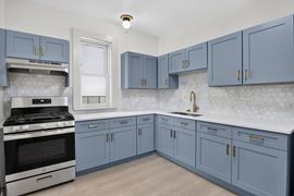 1528 E 74TH PL | 6 Unit Multifamily
