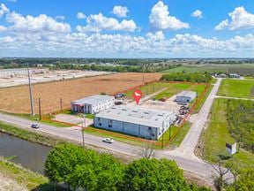 Dual Warehouses Near Hwy 90 with Surplus Land and Office