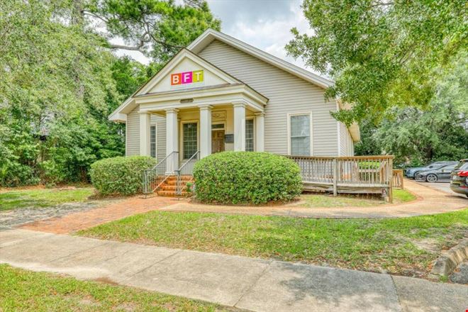 SALE OR LEASE:  Incredible commercial office or residential building with additional development potential, a brief walk from all downtown Thomasville