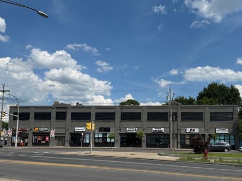 Syracuse Mixed-Use Corner Building – Retail Income + Residential Conversion