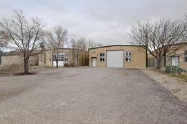 RARE WAREHOUSE WITH GATED & PAVED YARD