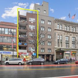 Prime Investment Opportunity: Fully Leased 10-Unit Building with Commercial Space