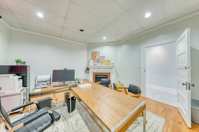SALE OR LEASE:  Incredible commercial office or residential building with additional development potential, a brief walk from all downtown Thomasville