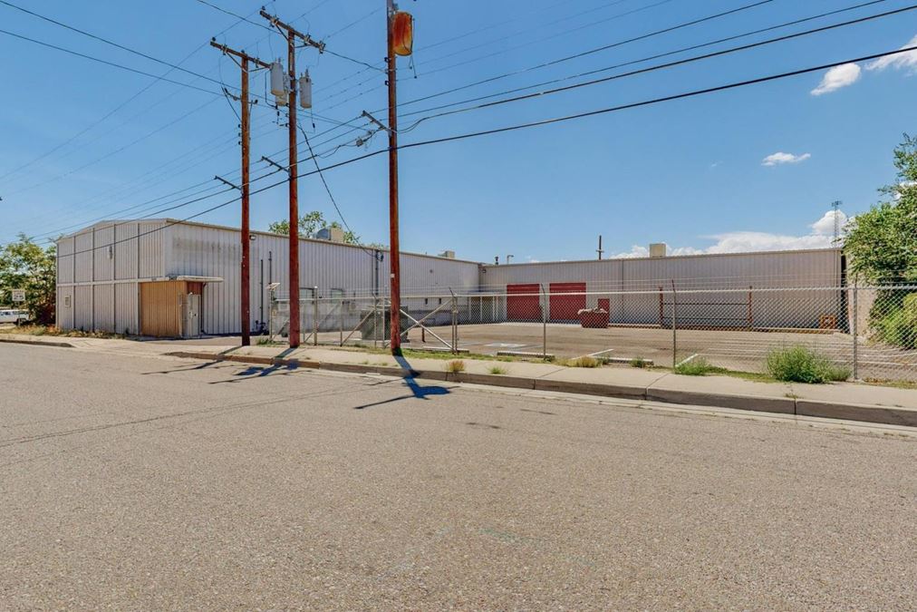 Newly Updated Clearspan Warehouse with Gated & Paved Yard near Big I