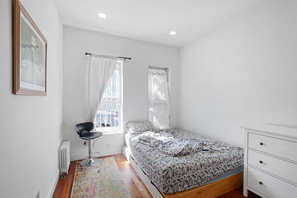 36-26 11th St