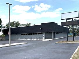 PREMIER TAMPA SHOWROOM- 13,296 SF Freestanding Building 1.42 ACRES  Signalized corner  LED Billboard Signage