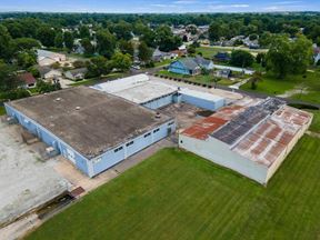 35,000+ SF Industrial Facility | 2.46 AC | Fenced Storage