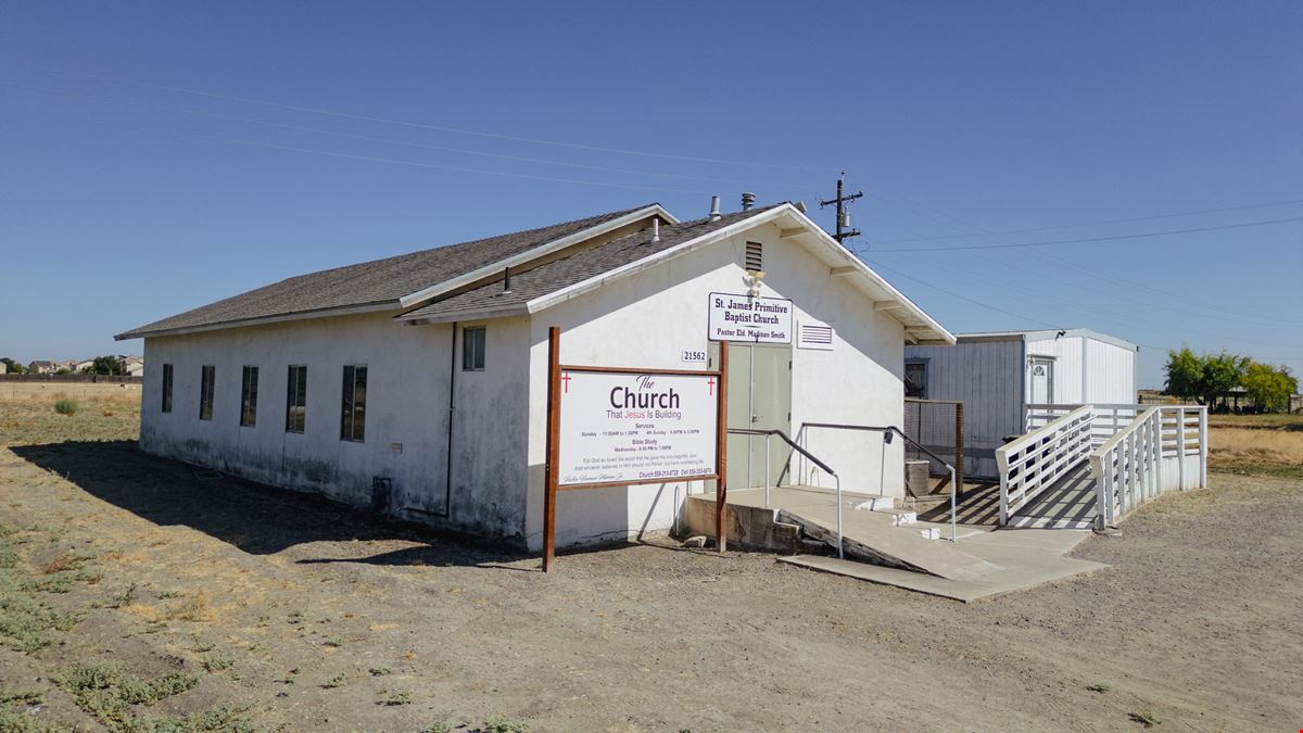 Church building with Modular home and 2 Sheds perfect for storage!