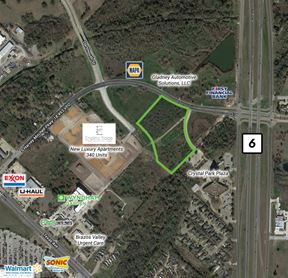 ~10.5 AC Along the South Side of Harvey Mitchell Parkway