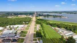 Commercial Investment & Redevelopment Opportunity | Approximately 600' of Highway 105 Frontage | Owner Financing Available