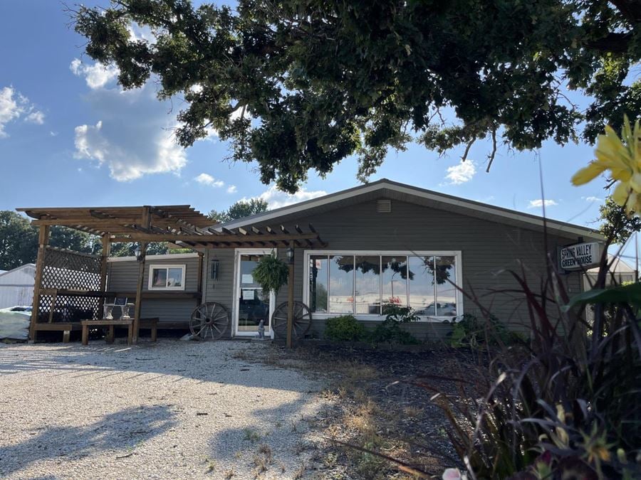 Highway 63 Commercial Building and Land For Sale