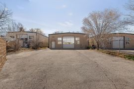 RARE WAREHOUSE WITH GATED & PAVED YARD