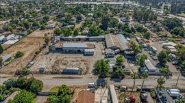 Open Industrial Buildings on 2.14 AC Fenced Land