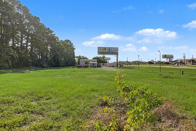 Commercial Investment & Redevelopment Opportunity | Approximately 600' of Highway 105 Frontage | Owner Financing Available