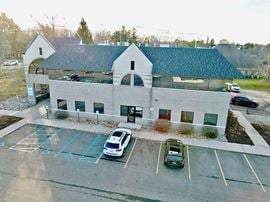 702 W Lake Lansing Rd
