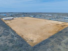 10 Acres + RV Hookup Maintenance Facility