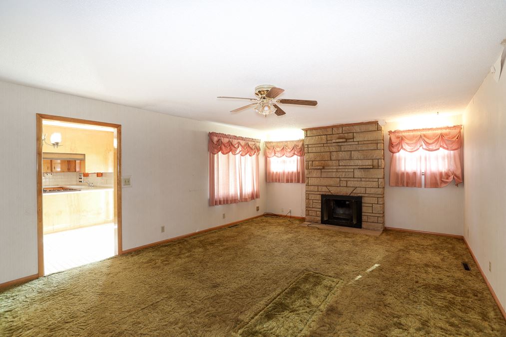 Weigand Online Only Absolute Auction: Ranch Home in a Quiet, Rural Setting On 0.9± Acres
