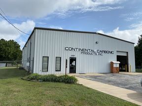 FREESTANDING INDUSTRIAL WITH DOCK DOORS AND FENCED YARD