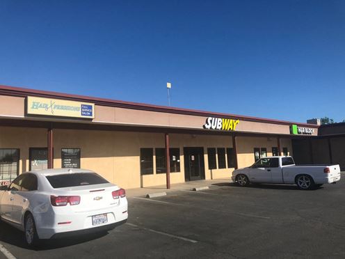 Two Spaces Available in Armona Shopping Center off HWY 198