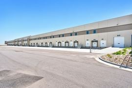 FIRST AURORA COMMERCE CENTER