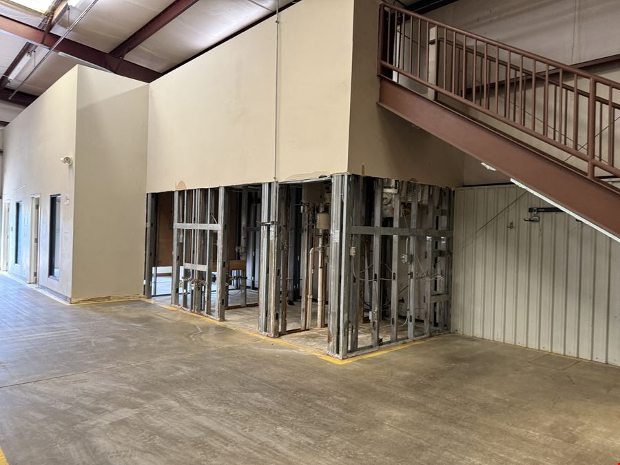 FREESTANDING INDUSTRIAL WITH DOCK DOORS AND FENCED YARD