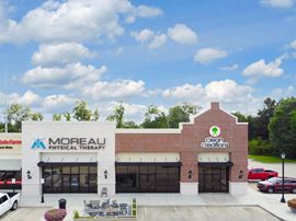 Highland Park Marketplace: Upscale Grocery Anchored Retail Center